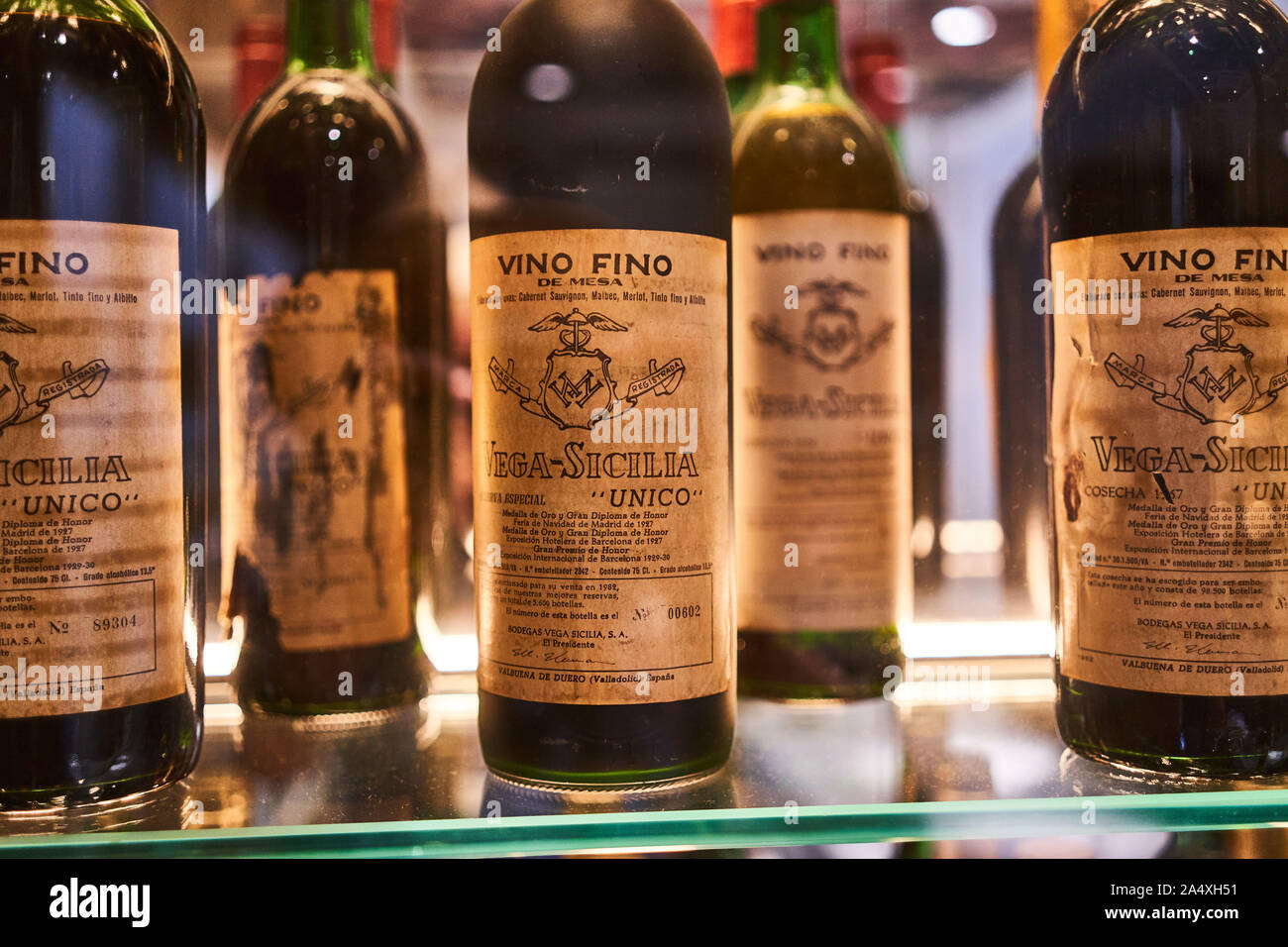 A collection of old Ribera del Duero wines from Vega Sicilia kept in display cases in the restaurant of Victor Montes jatetxea in old town Bilbao Stock Photo