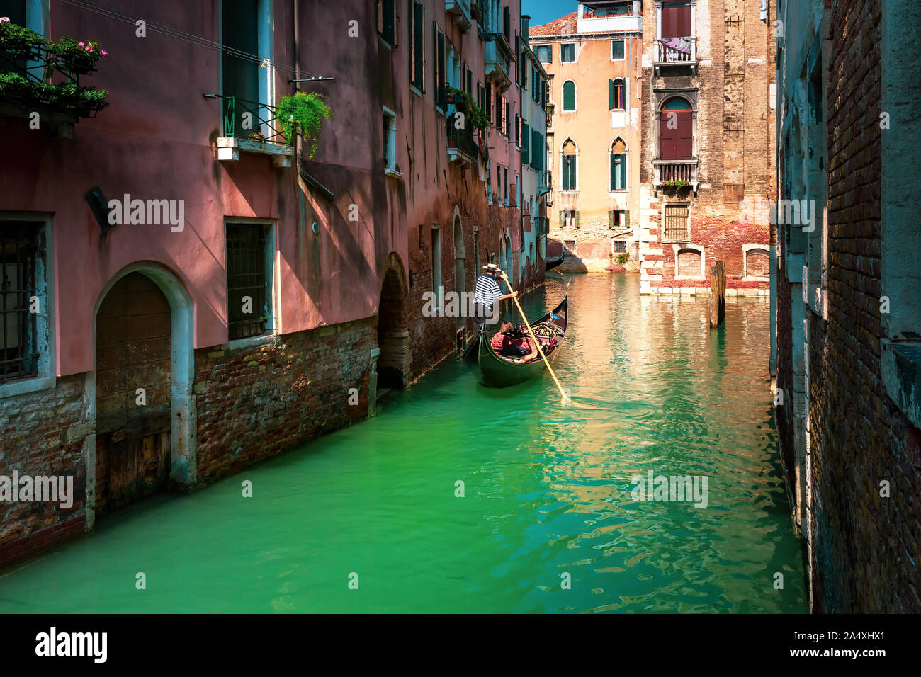Gondolas on Canal in Venice, Italy Stock Photo