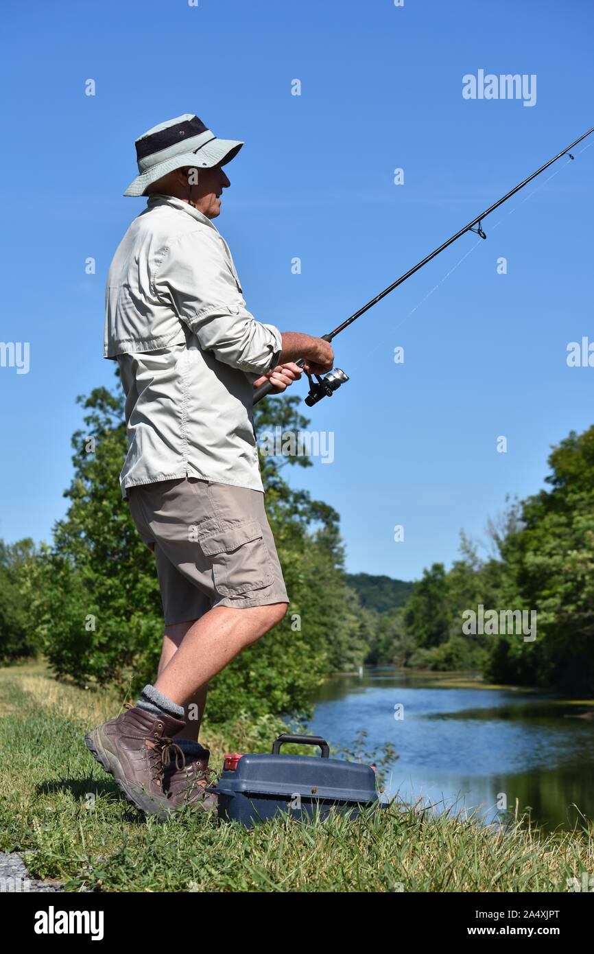 Old standing fisherman hi-res stock photography and images - Alamy