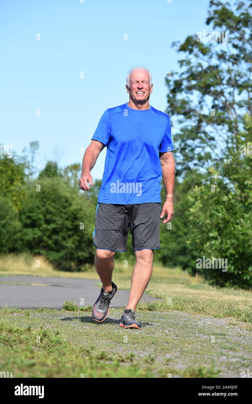 Senior walking hi-res stock photography and images - Alamy