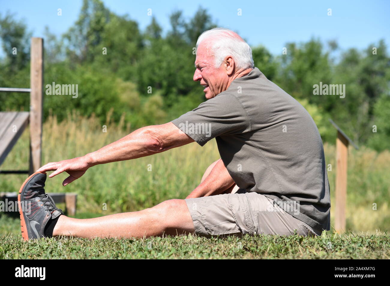 Stretching Army Male Veteran Stock Photo