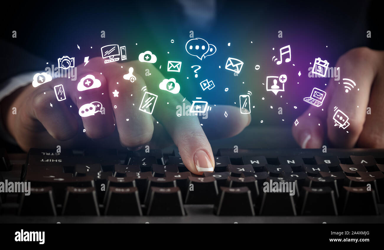Blogger woman typing on keyboard with drawn application icons around ...