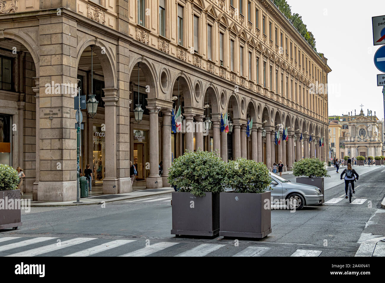 Arches and colonnaded porticos along Via Roma a high end shopping street in Turin,Italy Stock Photo