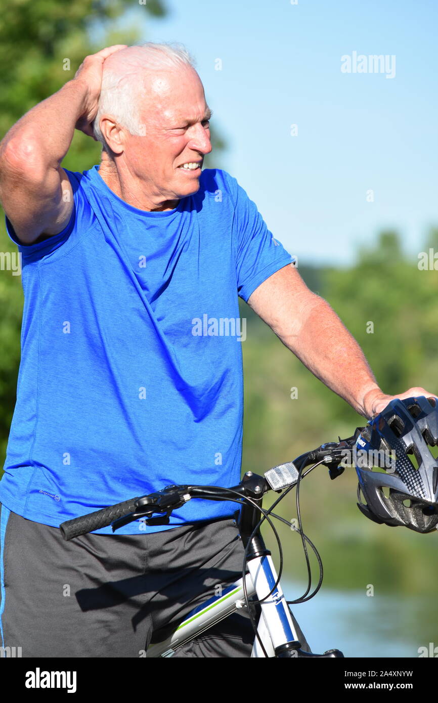 Adult Male Athlete Resting Wearing Helmet Riding Bike Stock Photo Alamy