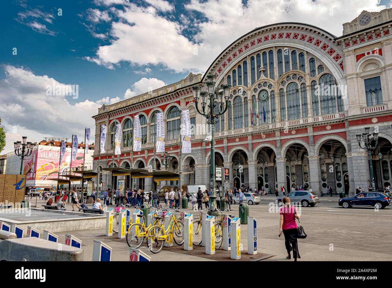 Hire bicycles outside the front the front entrance of Torino Porta Nuova railway station ,Turin's main and busiest railway station ,Turin ,Italy Stock Photo