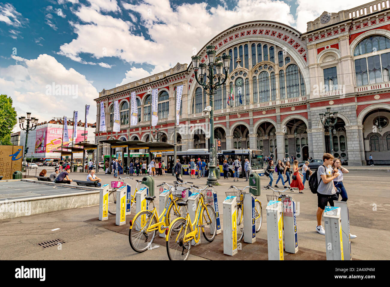 Hire bicycles outside the front the front entrance of Torino Porta Nuova railway station ,Turin's main and busiest railway station ,Turin ,Italy Stock Photo