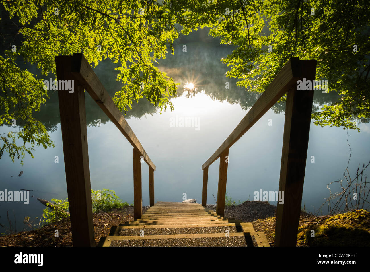 Beautiful reflection of the sunrise at Grundy Lakes Park in Tracy City