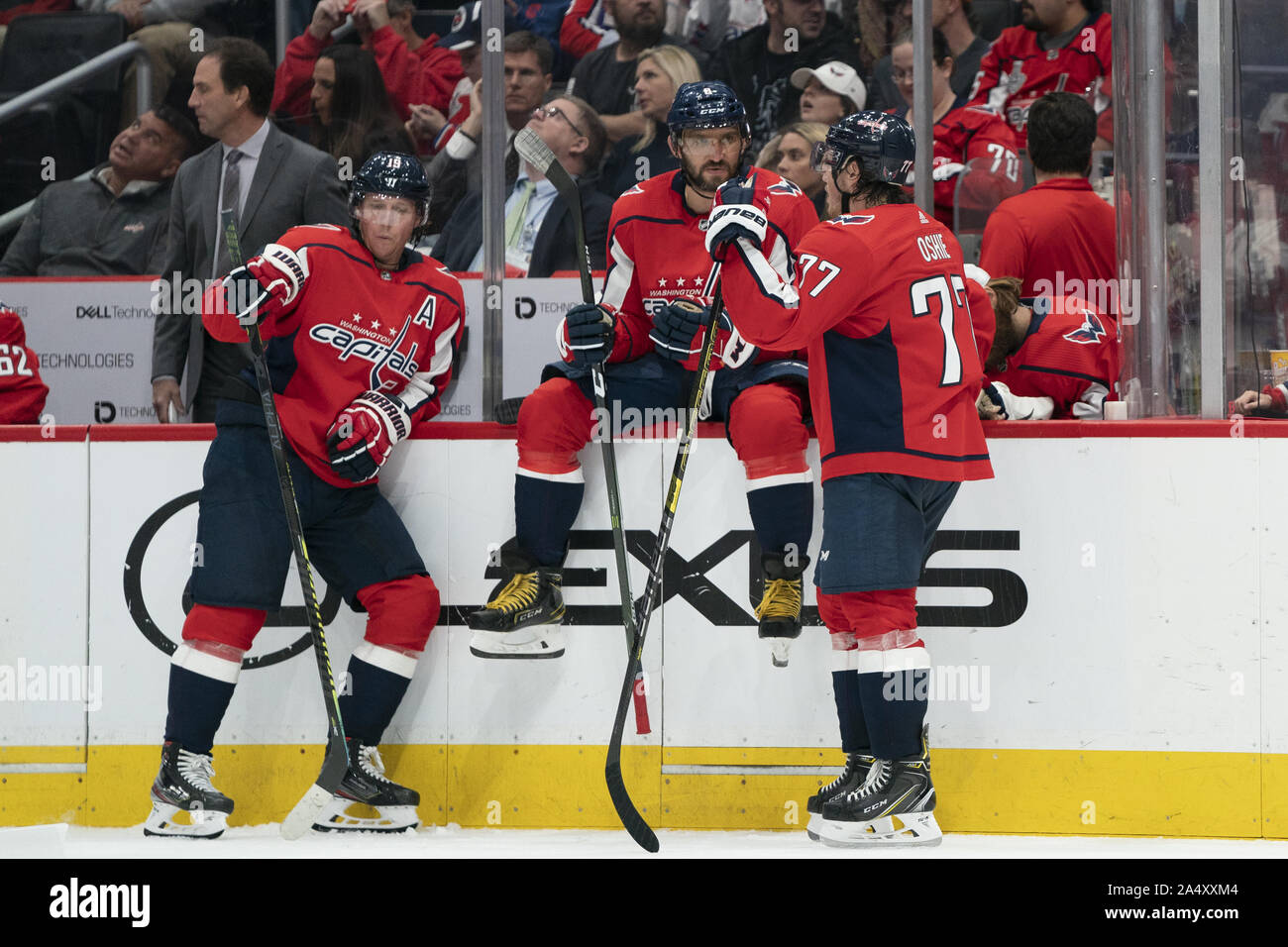 Washington, United States. 16th Oct, 2019. Washington Capitals players from left to right center Nicklas Backstrom (19), left wing Alex Ovechkin (8), and right wing T.J. Oshie (77), talk after a stoppage in play during the third period as the Caps play the Toronto Maple Leafs at Capital One Arena in Washington, DC on Wednesday, October 16, 2019. The Capitals host the Toronto Maple Leafs to start a 3 game home stand tonight. Photo by Alex Edelman/UPI Credit: UPI/Alamy Live News Stock Photo
