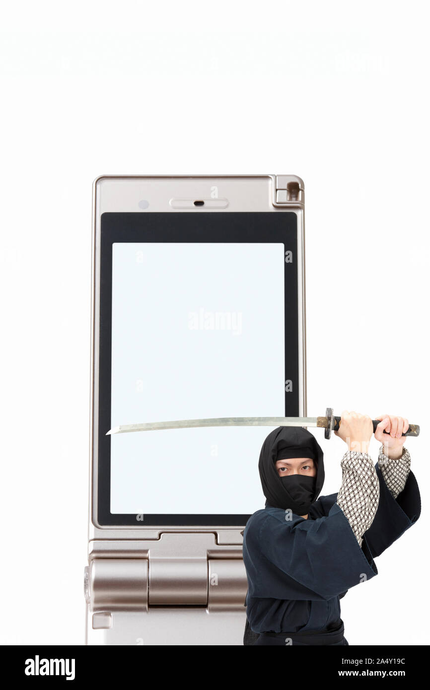Ninja and mobile phone screen Stock Photo Alamy