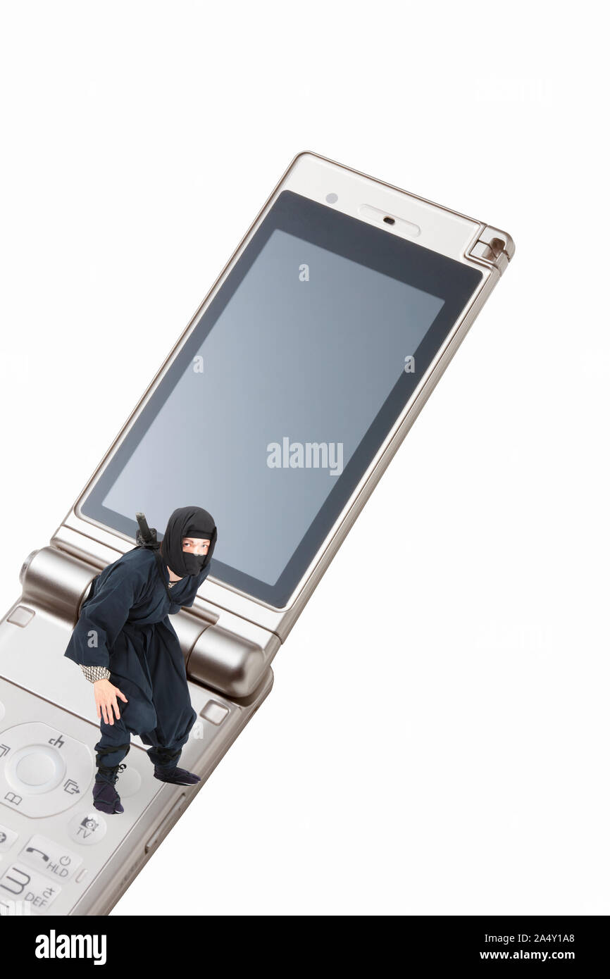 Ninja and mobile phone screen Stock Photo Alamy