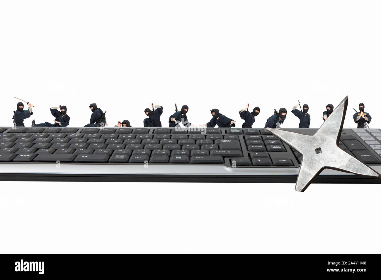 Keyboard and ninja Stock Photo