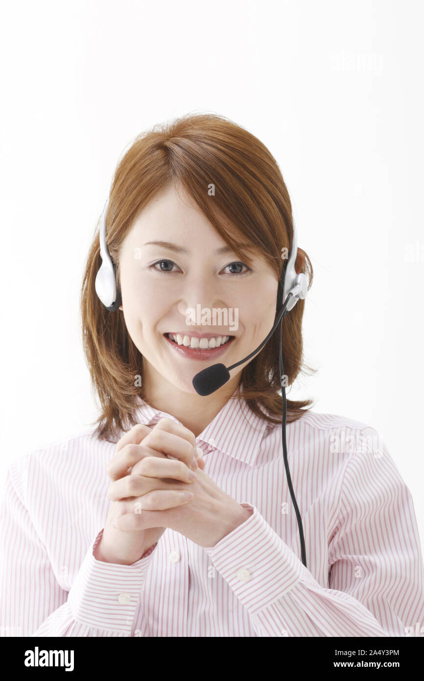 A telephone operator talking into a mic Stock Photo Alamy