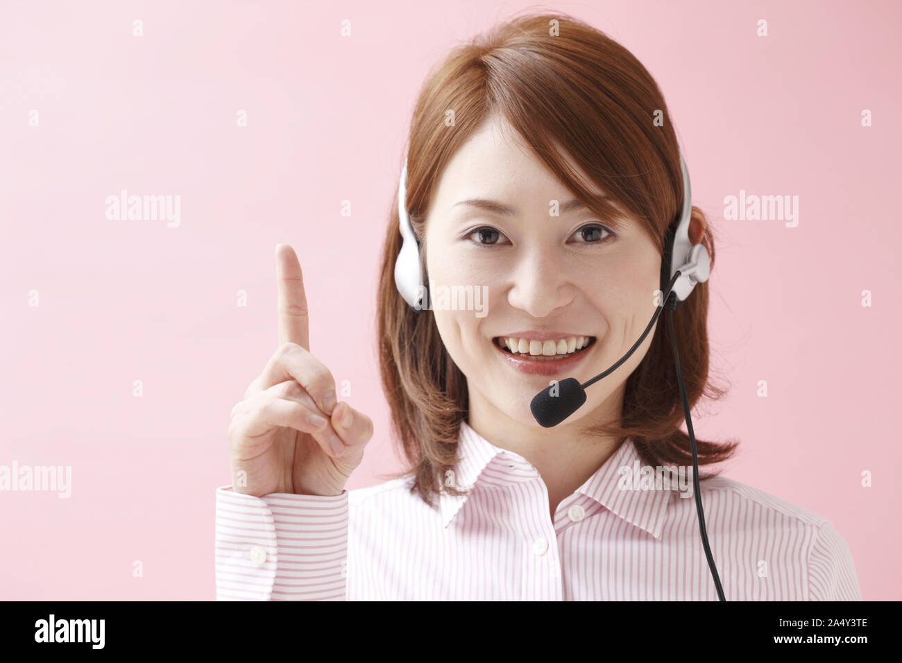 A telephone operator talking into a mic Stock Photo Alamy