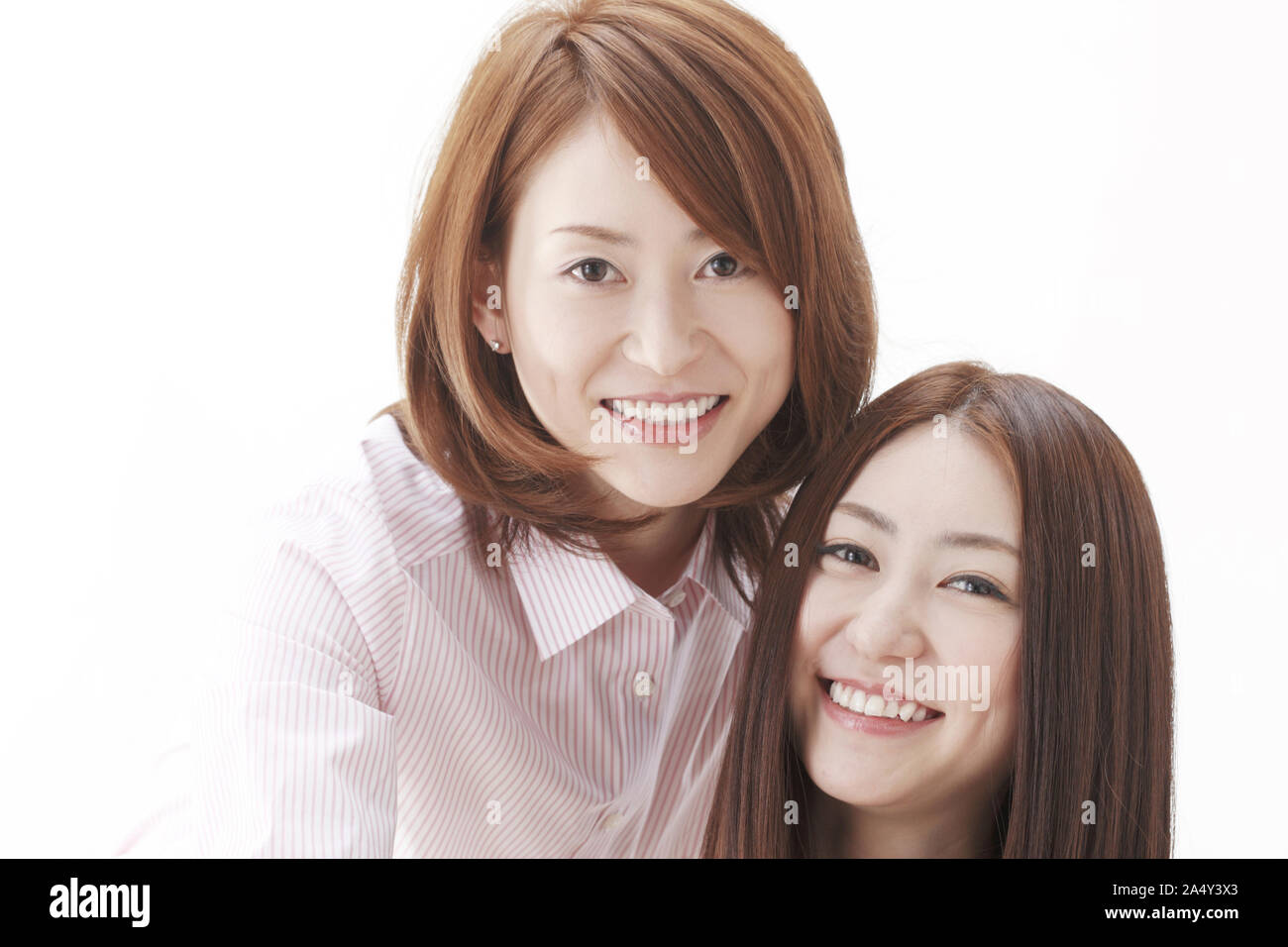 Two young attractive asian female hi-res stock photography and images ...
