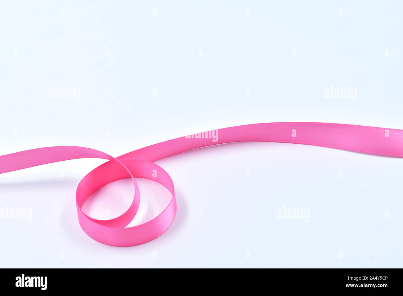Pink Curly Ribbon Stock Photo - Download Image Now - Ribbon