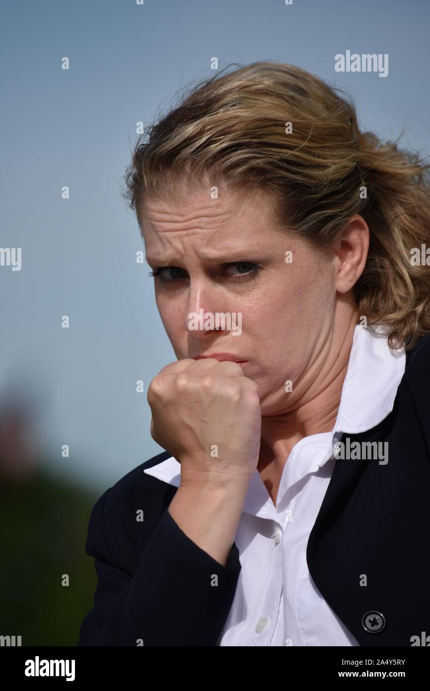 Fearful Adult Blonde Person Wearing Suit Stock Photo