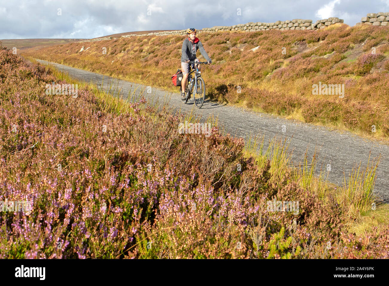 Cyclist on the Waskerley Way, part of the Coast to Coast route near Stanhope Stock Photo