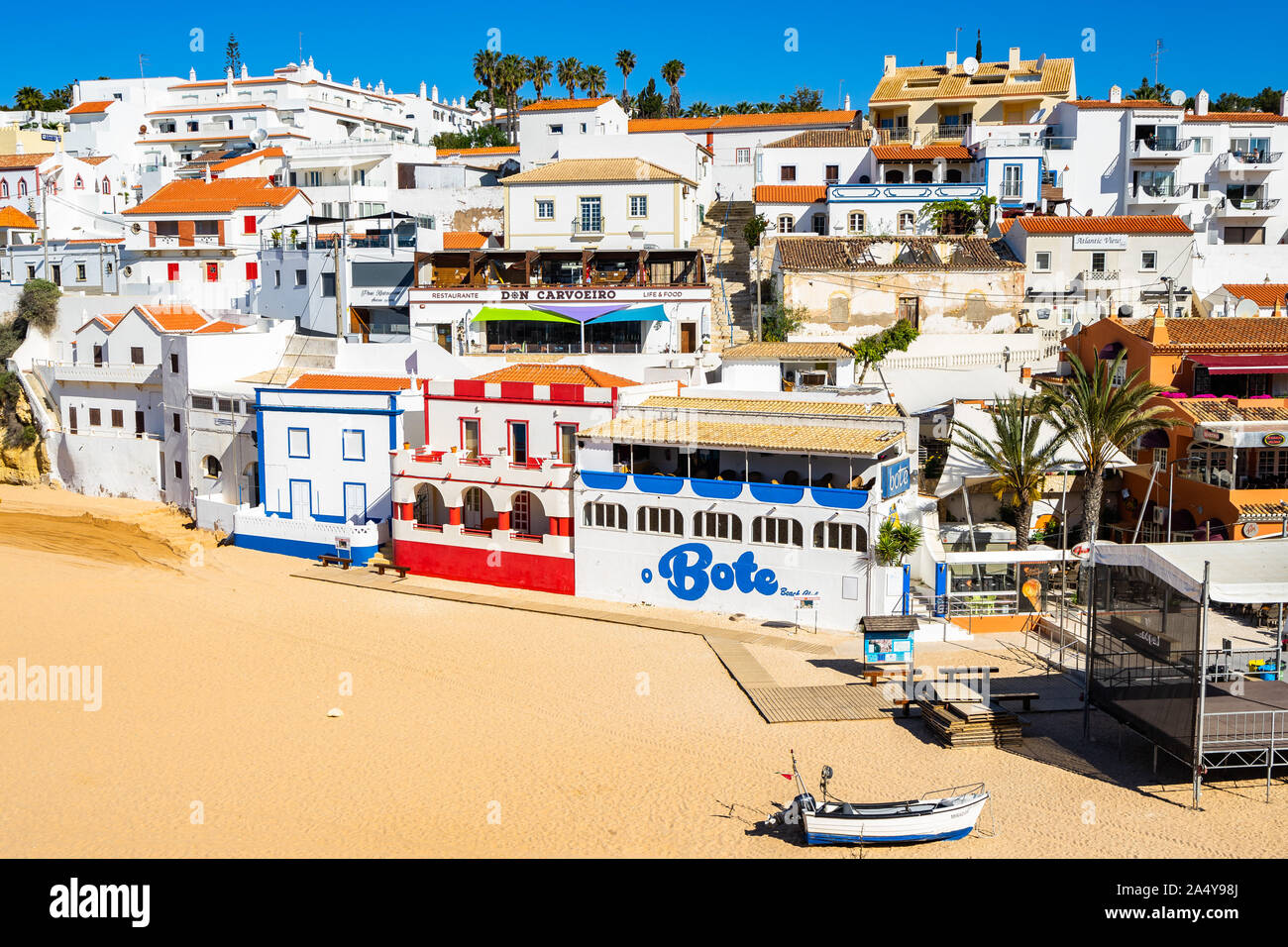 Picturesque fisherman houses at Carvoeiro beach. Carvoeiro, Algarve, Portugal, April 2019 Stock Photo