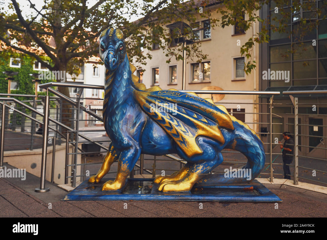 Worms, Germany - October 2019: Sculpture of a blue 'Lindworm' dragon in city center of Worms, dedicated to Germanic heroic 'Nibeungen' legend Stock Photo