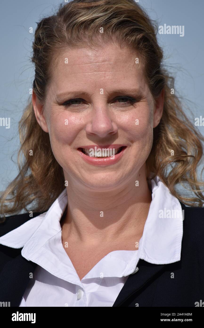 Adult Business Woman Smiling Wearing Suit Stock Photo - Alamy