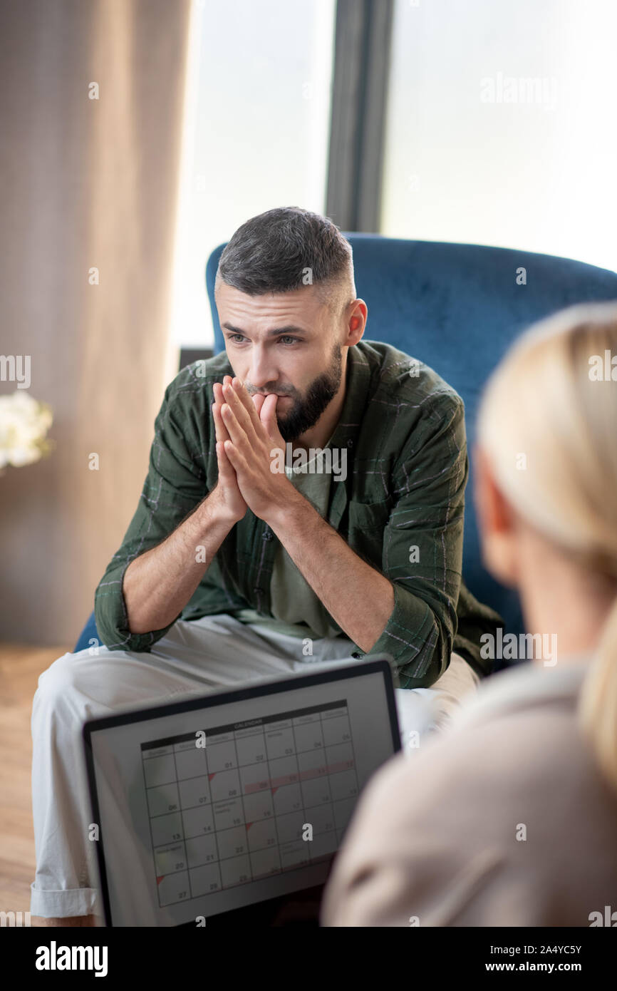 Man coming to psychologist after divorce with wife Stock Photo Alamy