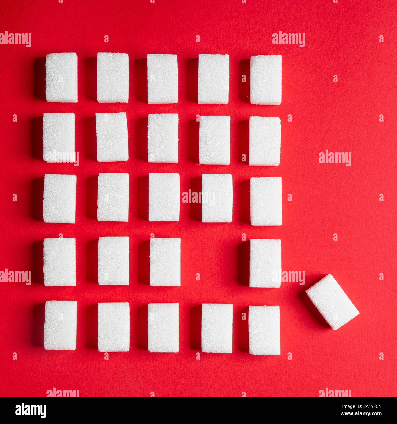 a sugar cube out of the position Stock Photo Alamy