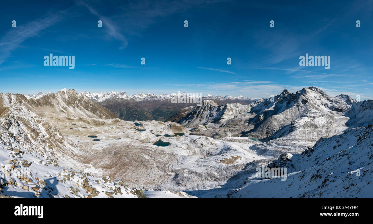 panoramic view over Lais da Macun in the Swiss National Park in first snow Stock Photo
