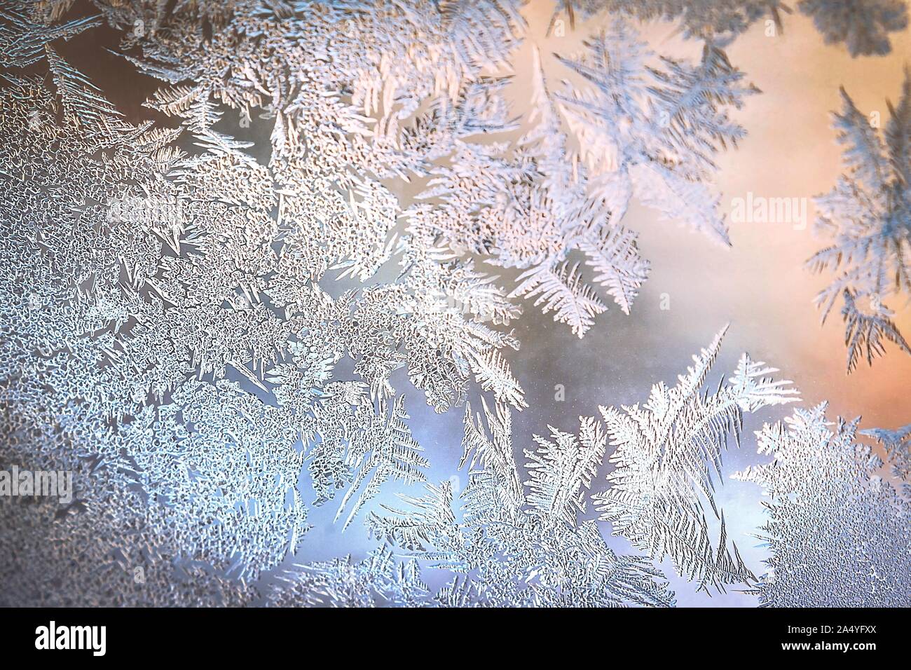 Frosty Window Glass with Natural Ice Patterns and Blurred Colorful ...