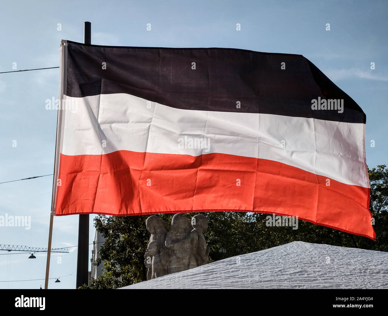 Munich, Bavaria, Germany. 19th Sep, 2019. The black white red Weimar flag  used in Germany in the post-WWI era and currently associated with the  extreme-right spectrum. The Verfassungsschutz-monitored (Secret Service)  Reichsbuerger (Sovereign