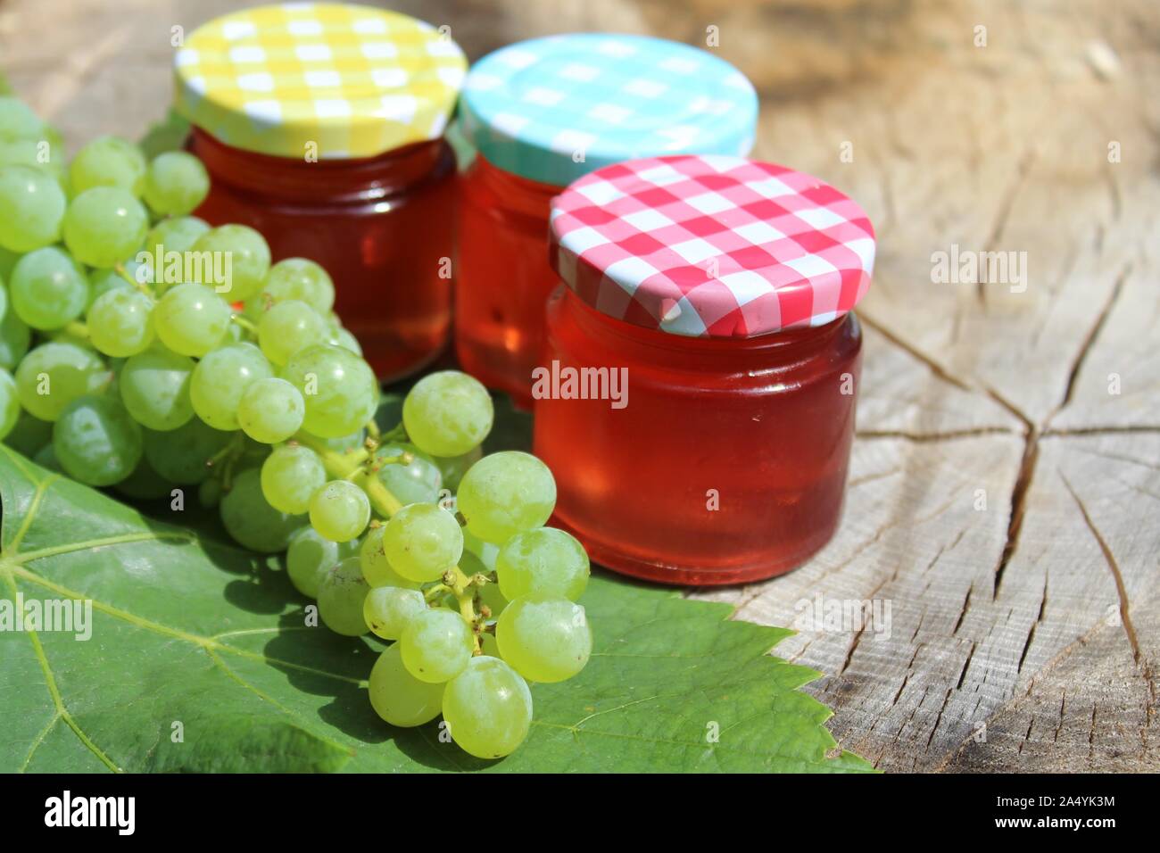 The picture shows wine jelly and grapes Stock Photo Alamy
