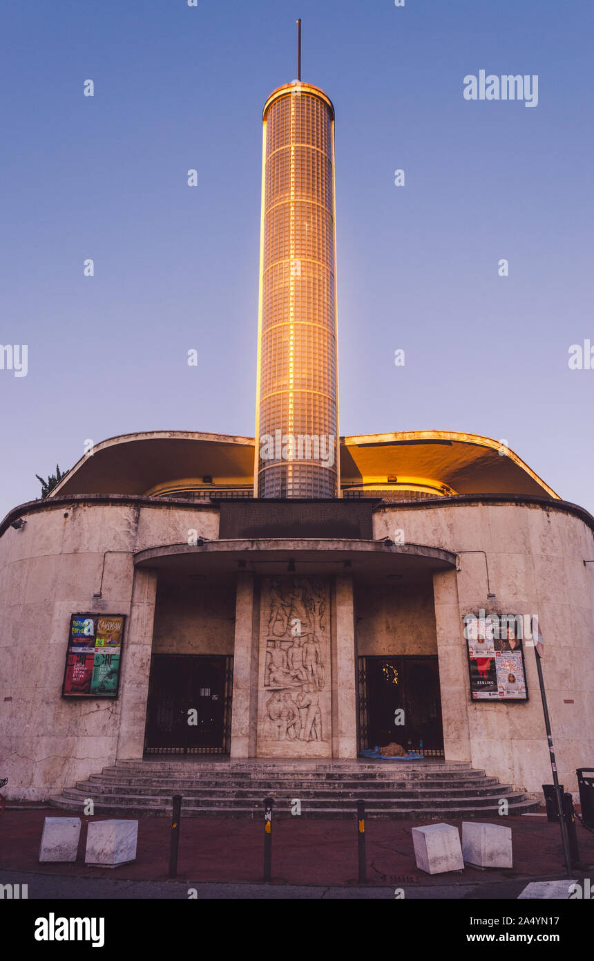 Florence, Tuscany, italy front and access doors of movie teather Cinema Puccini with its glass block tower. An example of fascist era architecture Stock Photo