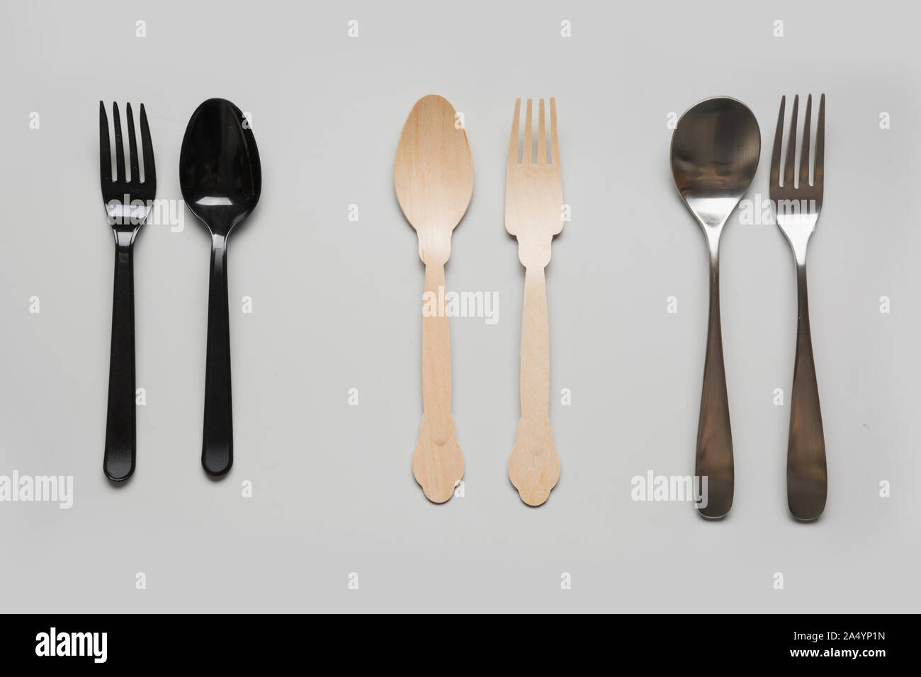 Comparison of reusable metal cutlery, harmful disposable plastic and