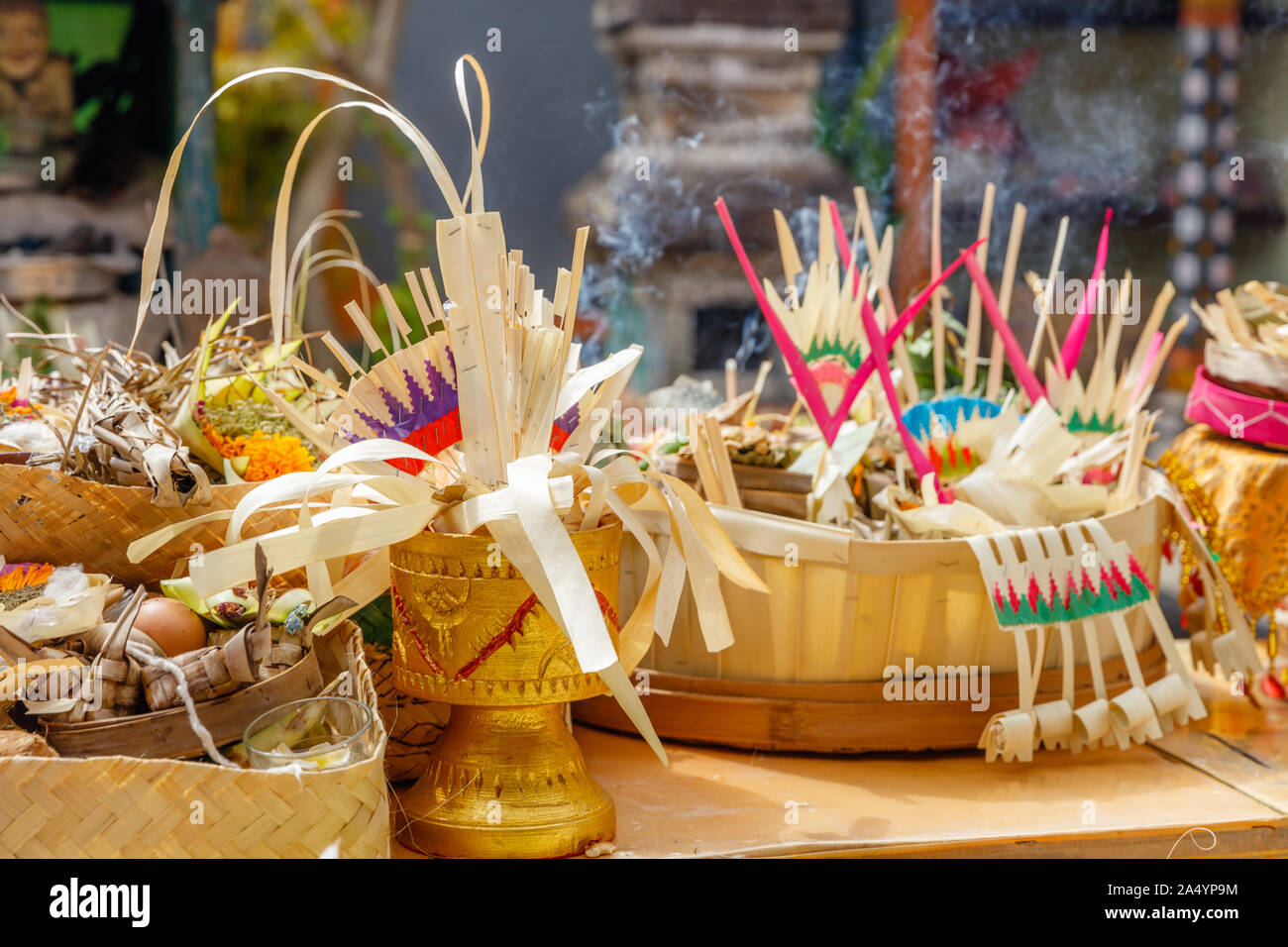 Traditional Balinese offering at a family temple (Sanggah Kemulan Rong) during Hindu religious ceremony. Bali Island, Indonesia Stock Photo