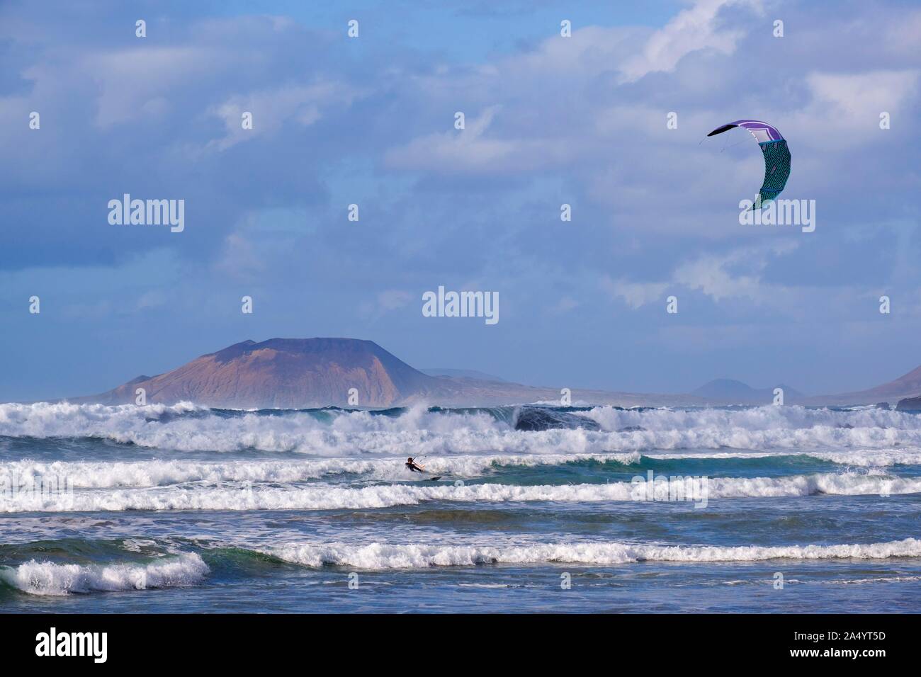Kitesurfer, near Caleta de Famara, behind La Graciosa, Lanzarote, Canary Islands, Spain Stock Photo