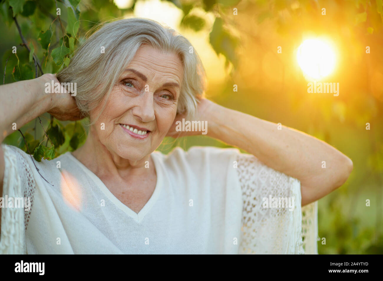 Happy senior woman in hi-res stock photography and images - Alamy