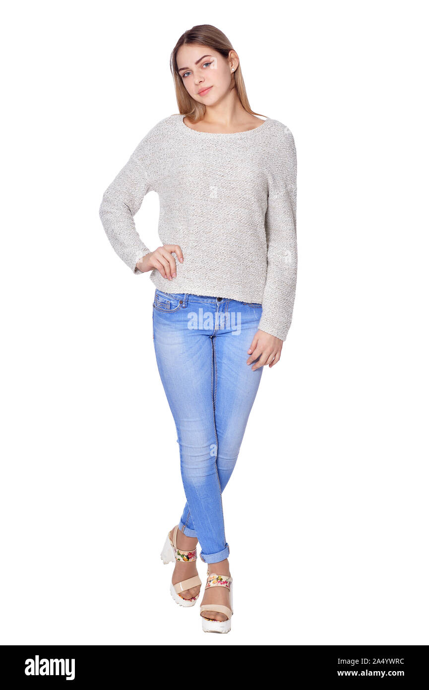 beautiful woman in jeans posing on white Stock Photo - Alamy