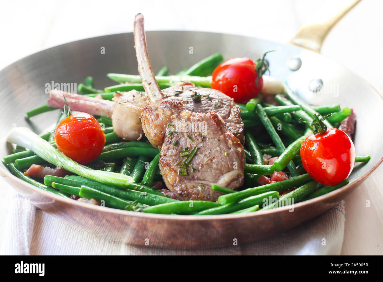 Lamb Chops With Green Beans And Tomatoes Stock Photo Alamy