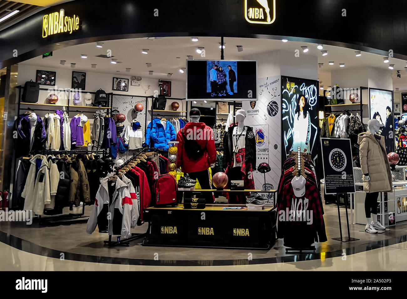 No customer appears at an NBA store, whose employee says he has no problem changing jobs, and where products of Houston Rockets, a basketball team in NBA, are removed, in Zhengzhou city, central China's Henan province, 16 October 2019. Stock Photo