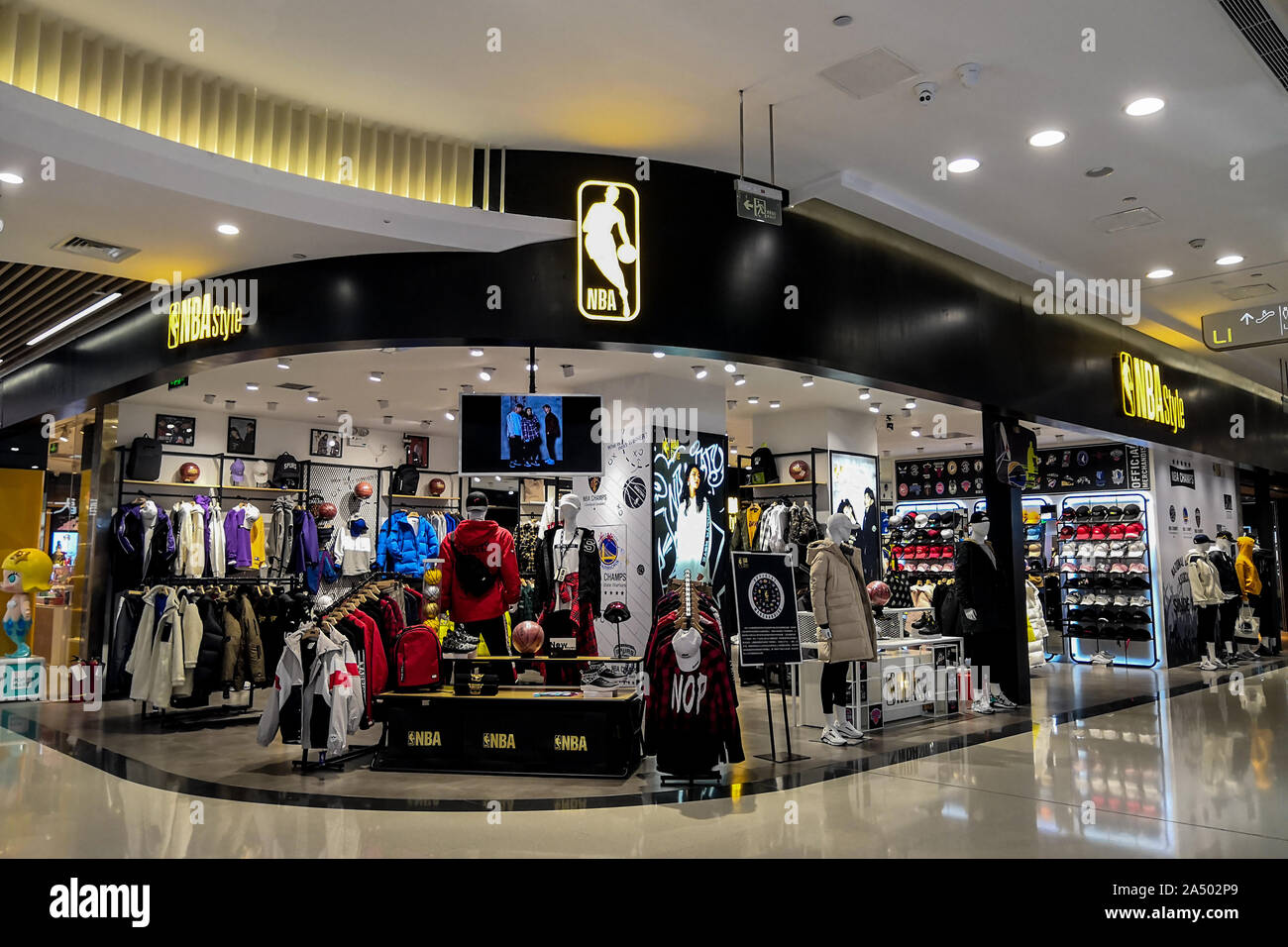 No customer appears at an NBA store, whose employee says he has no problem changing jobs, and where products of Houston Rockets, a basketball team in NBA, are removed, in Zhengzhou city, central China's Henan province, 16 October 2019. Stock Photo