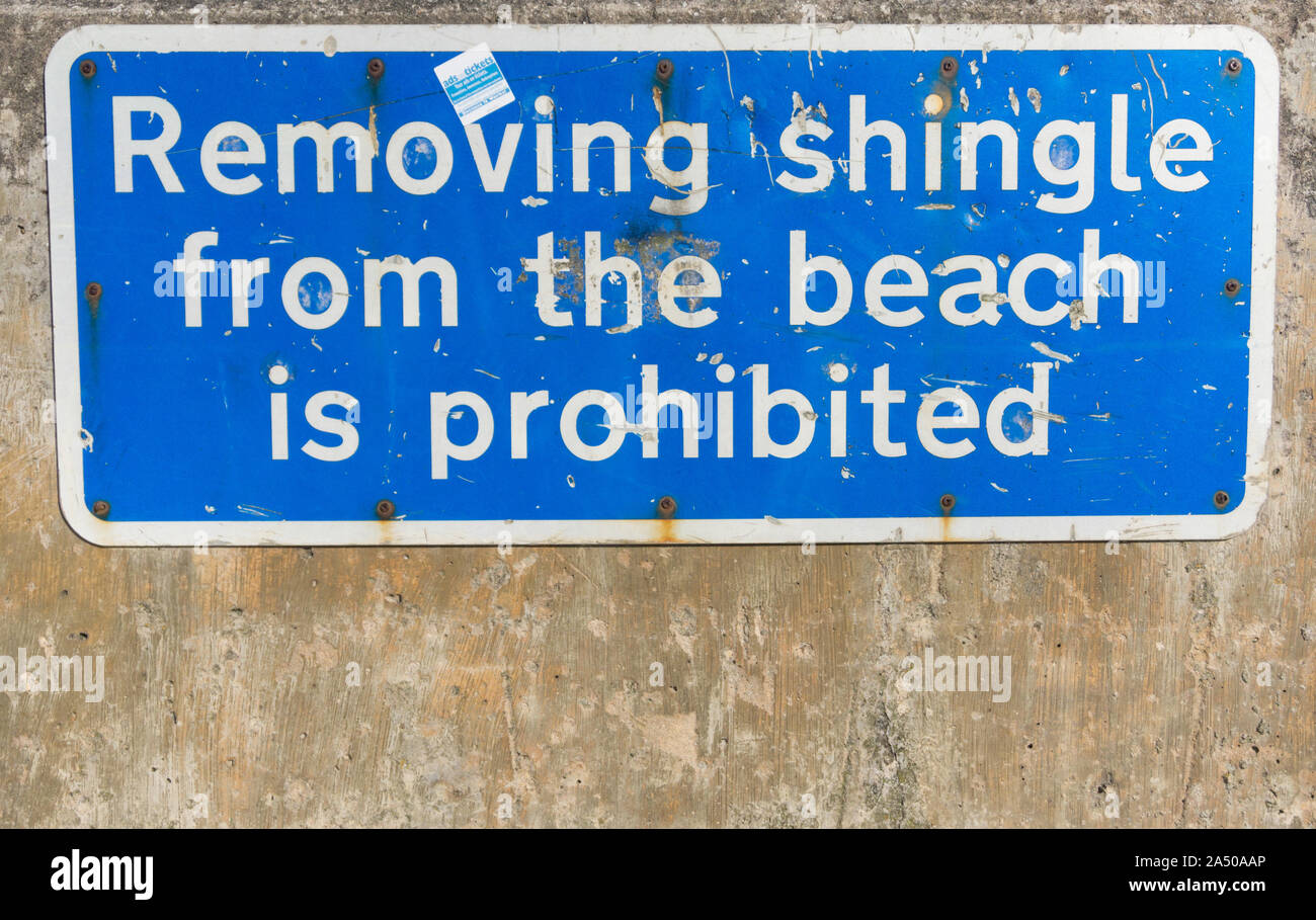 Sign prohibiting shingle removal at the beach in Stonehaven, UK Stock Photo