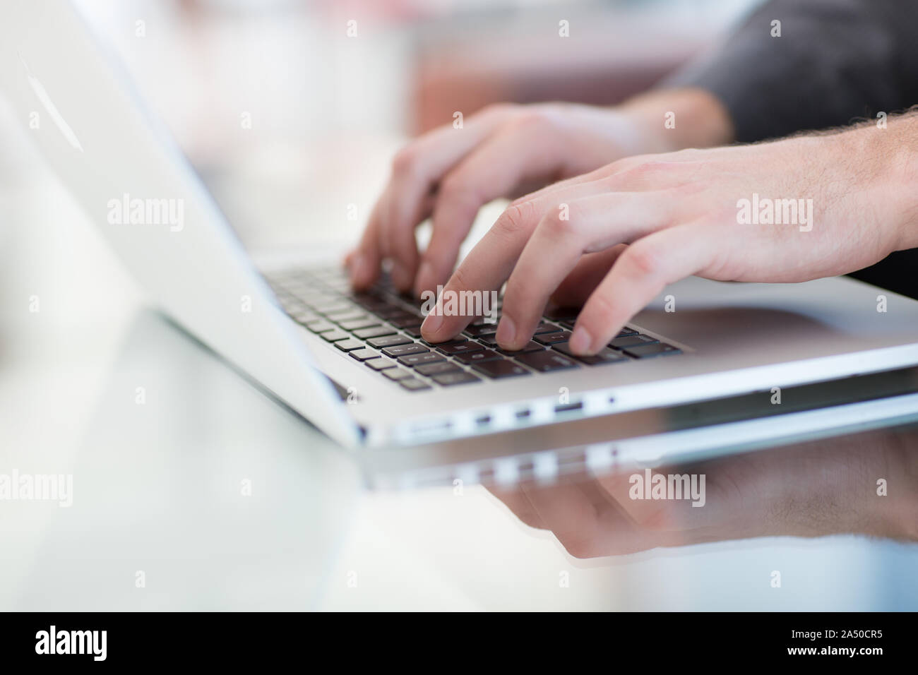 Work on a laptop - as always, the programmer pretends to work Stock Photo