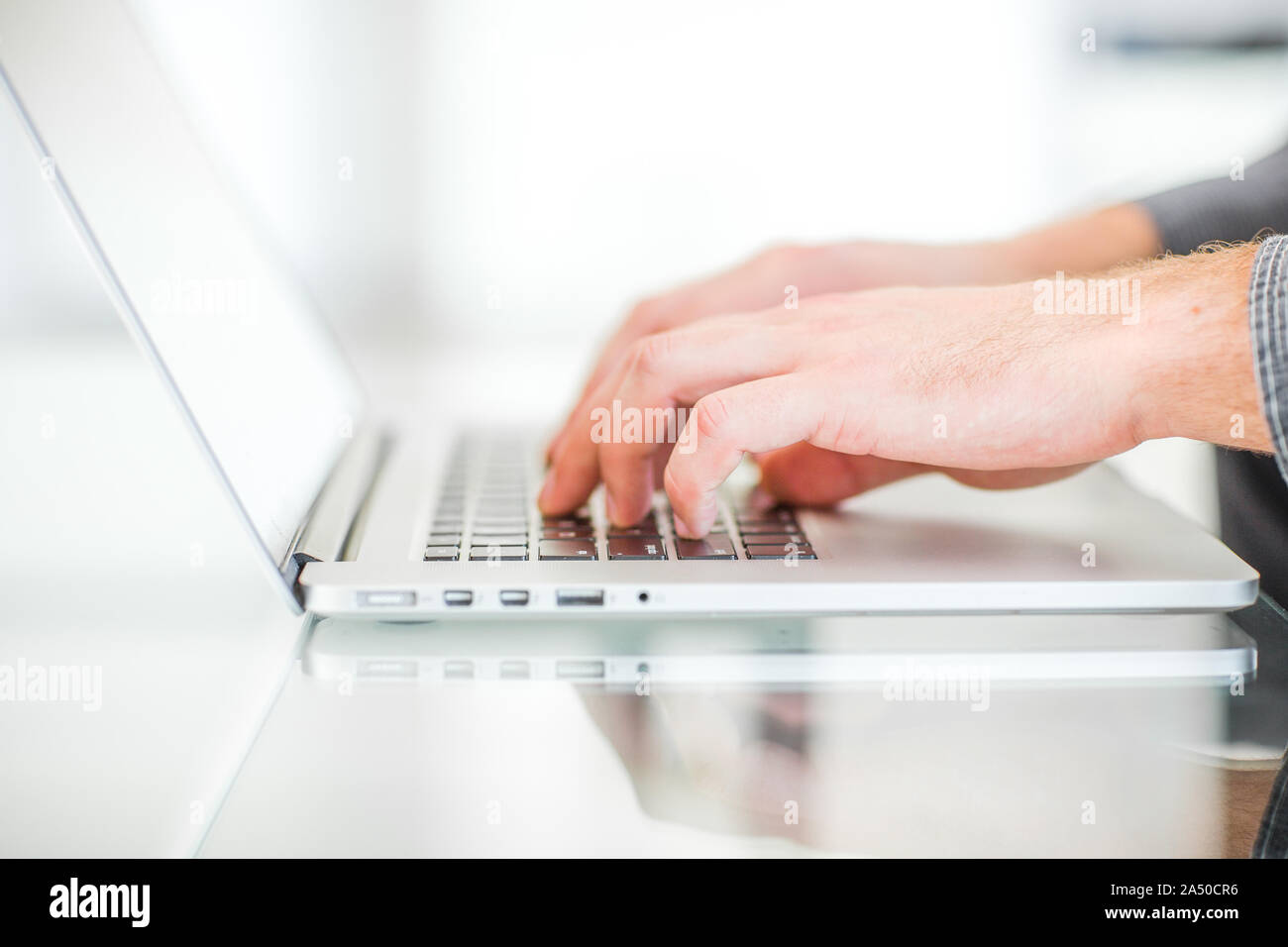 Work on a laptop - as always, the programmer pretends to work Stock Photo