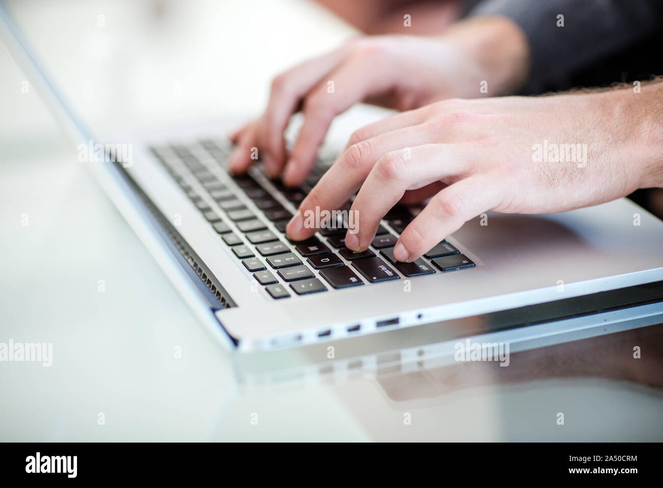 Work on a laptop - as always, the programmer pretends to work Stock Photo