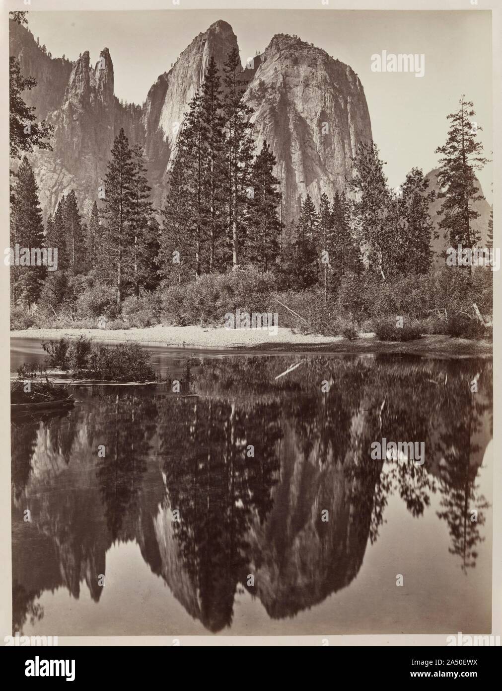 Cathedral Rocks and Reflections, Yosemite, 1864. In 1859, Charles L. Weed made the first photographs of the Yosemite region. Using the wet collodion process, he produced 40 stereoviews and some 20 large (10 x 14 inches) glass negatives. His pioneering photographs informed future visitors and artists of the region's scenic splendors. About five years later, in 1864, he returned to create his remarkable mammoth plate views (approximately 17 x 22 inches) of the valley. This image of Cathedral Rocks is among the best examples of Weed's ability to combine sublime subject matter with observation. Wi Stock Photo