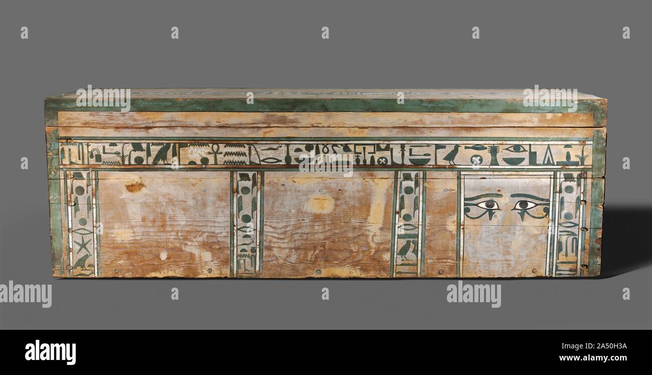 Coffin of Senbi, c. 1918-1859 BC. The most common type of coffin during the Middle Kingdom took the shape of a rectangular box with lid. The mummy inside was placed on his left side, facing east, his head behind the two magical eyes. These&#x2014;in the shape of human eyes, to which have been added the markings of a falcon's head&#x2014;were supposed to enable him to behold the rising sun, reborn daily. The long horizontal inscriptions are prayers to Anubis (god of embalming) and Osiris (god of the dead) for offerings of food and drink and other items necessary for survival in the afterlife. T Stock Photo