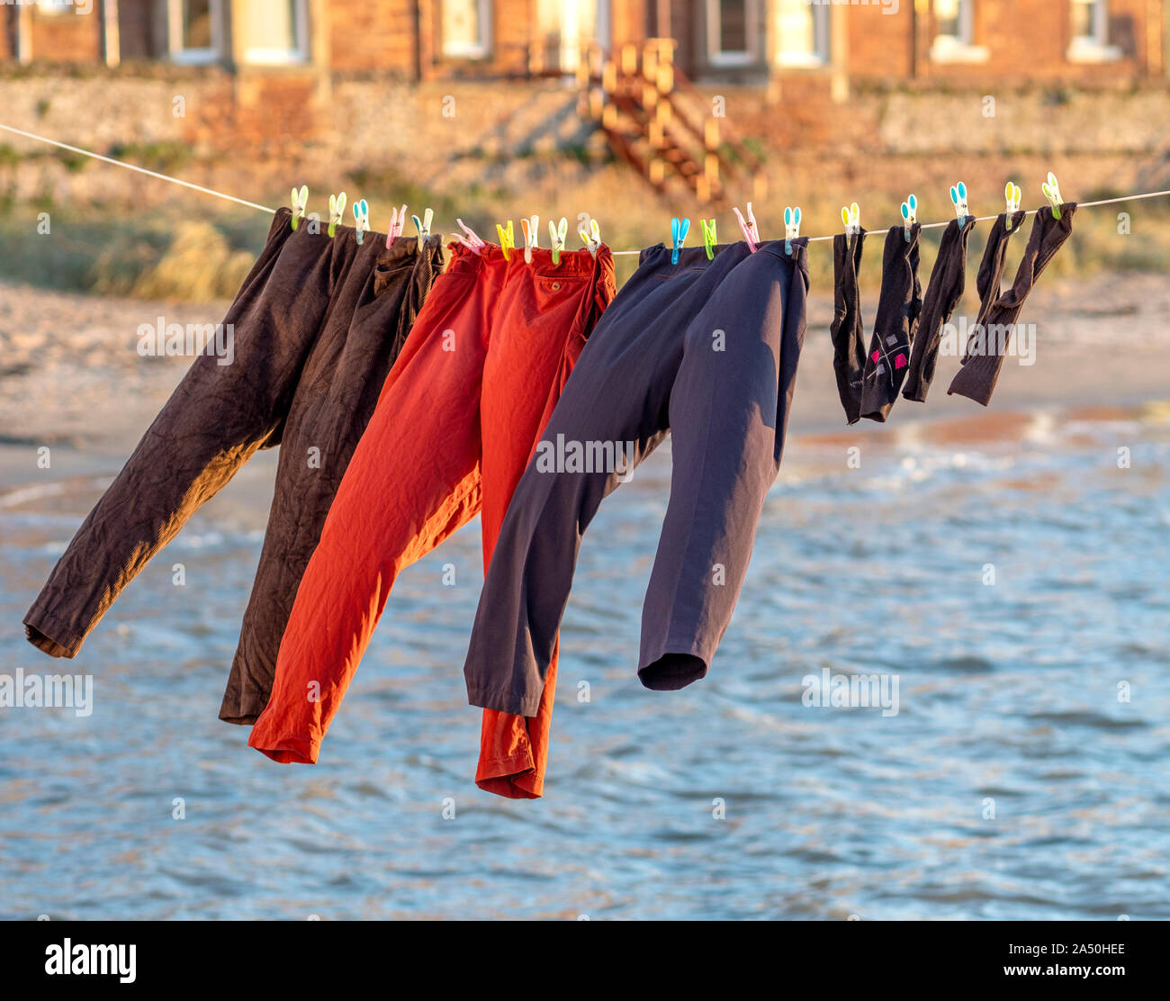 Washing drying on a clothes line Stock Photo