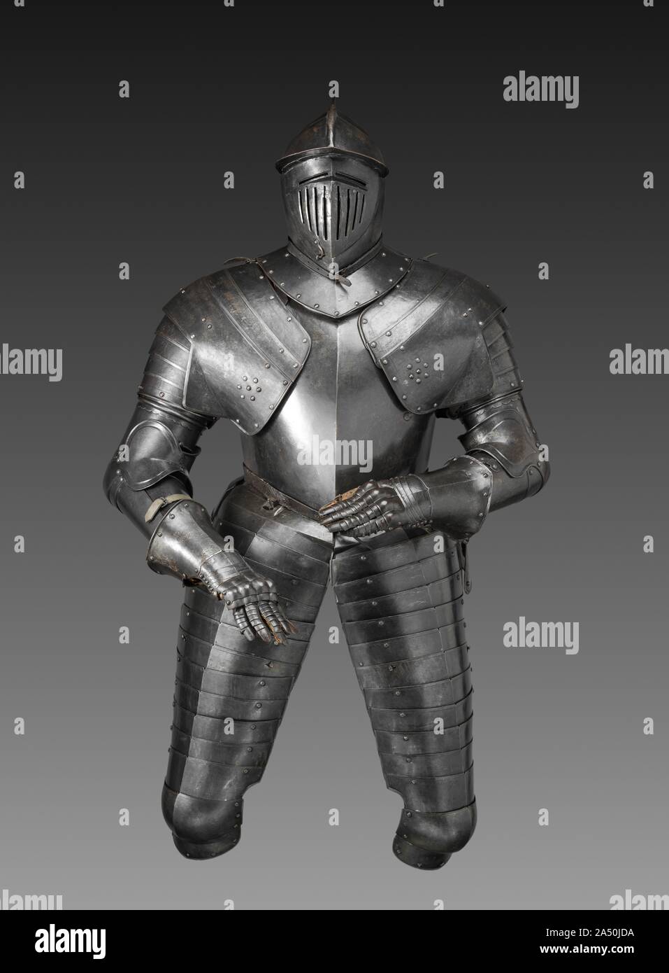 Cuirassier's Armor, c. 1600-1620. The cuirassier was the heavy cavalryman of the late 1500s and early 1600s. Carrying pistols and a sword, he was clad in full armor, like this suit, with the exception of his lower legs, which were protected by heavy riding boots. Shortly after 1650, such heavy cavalry armor disappeared from use. By then, European cavalries had abandoned full armor as impractical against the increased sophistication of firearms. Similar armors survive in the Armory of Graz, Austria. Stock Photo