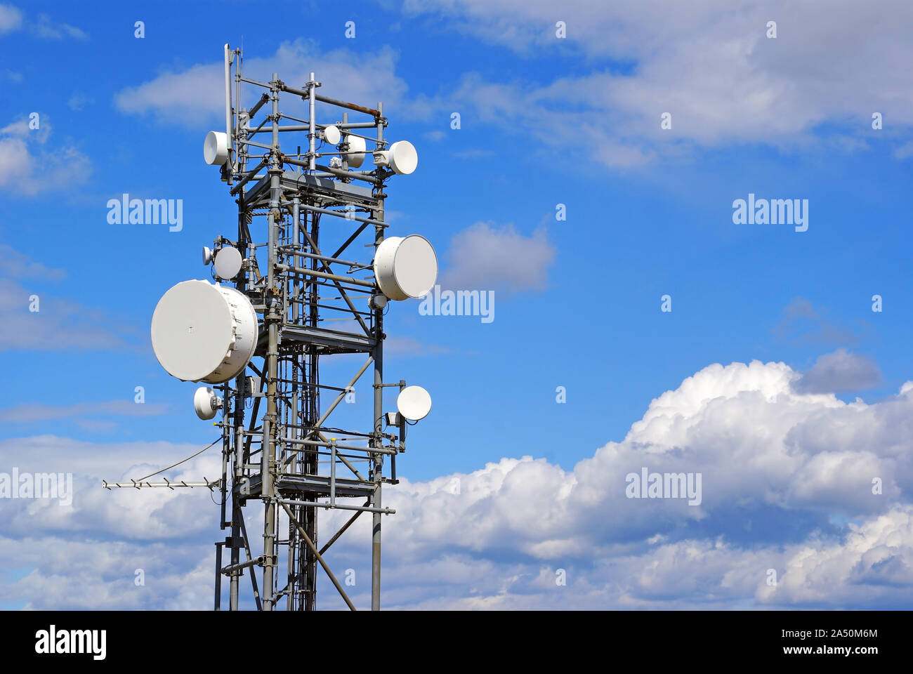 Radar and antennae on a background of blue sky Stock Photo - Alamy