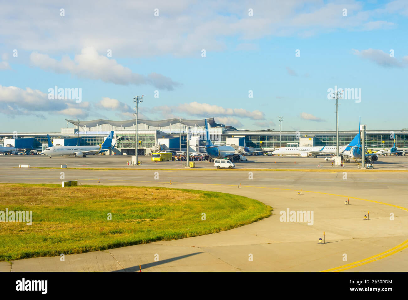 Airplanes, bus and passengers queue by the airport, Boryspil, Kyiv, Ukraine Stock Photo