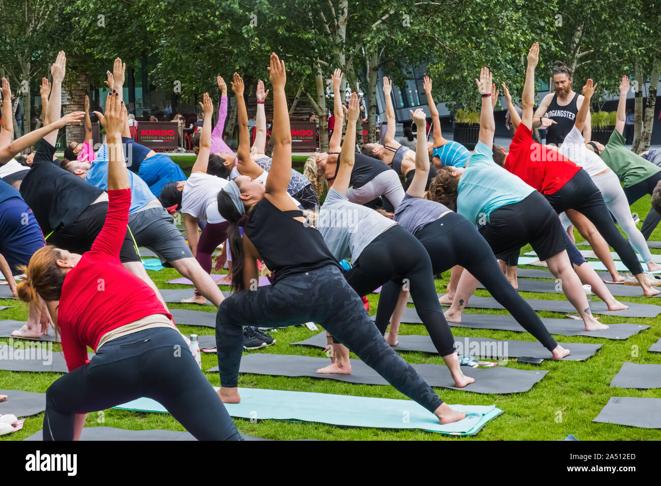 England, London, Southwark, Potters Field, Public Yoga Class Stock Photo